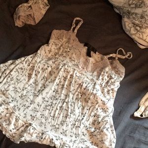 Medium pajama set, (Tank top and pants,) pink lace trim on top and bottoms.